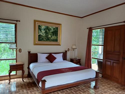Postel nebo postele na pokoji v ubytování Puri Saron Hotel Madangan - Gianyar