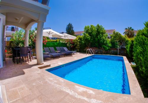Πισίνα στο ή κοντά στο SUNSET BEACH CLUB LEBRENTALS