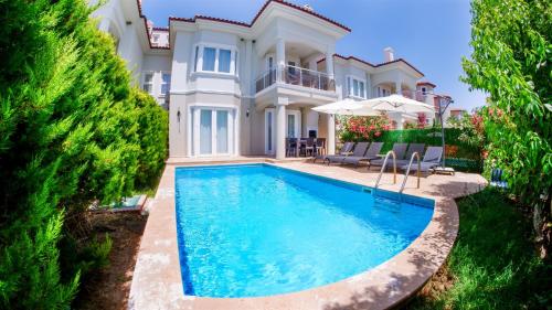 Πισίνα στο ή κοντά στο SUNSET BEACH CLUB LEBRENTALS