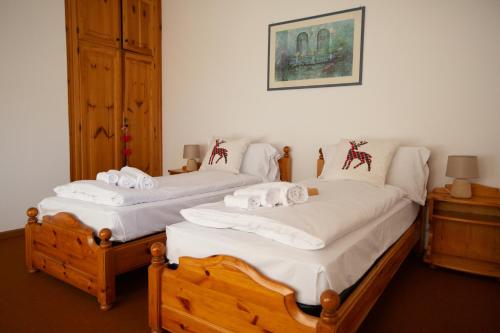 Letto o letti in una camera di Bike & Bikers Hotel Restaurant