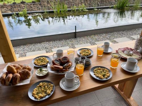 a table full of breakfast foods and drinks at Alexa Resort in Borovany
