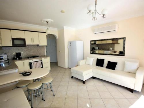 Η κουζίνα ή μικρή κουζίνα στο SUNSET BEACH CLUB LEBRENTALS