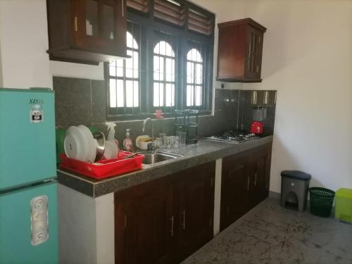 Η κουζίνα ή μικρή κουζίνα στο Bliss House