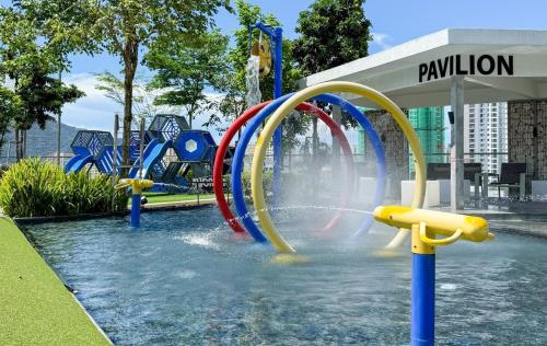 a water park with a bunch of water slides at Panoramic Georgetown City & Sea View with Netflix in Jelutong