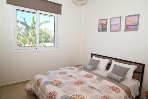 Ένα ή περισσότερα κρεβάτια σε δωμάτιο στο Myrteni guesthouse