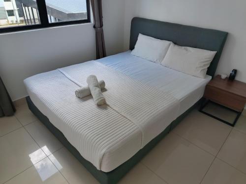Ένα ή περισσότερα κρεβάτια σε δωμάτιο στο Homestay Grandma