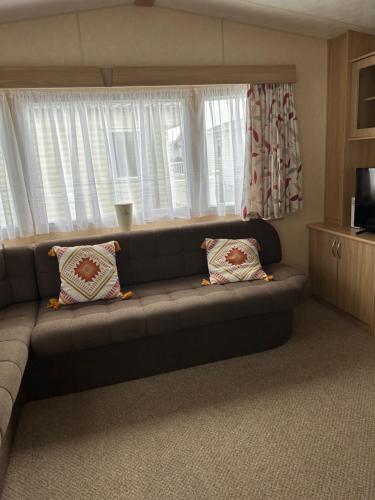 Ruang duduk di Six berth Holiday home