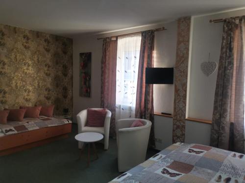 Postel nebo postele na pokoji v ubytování Wild West Hotel