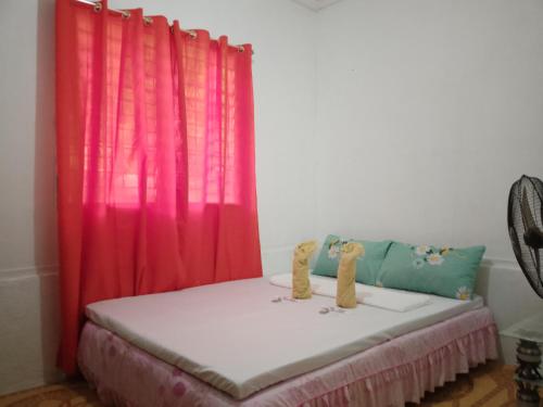 Postel nebo postele na pokoji v ubytování MDB Homestay