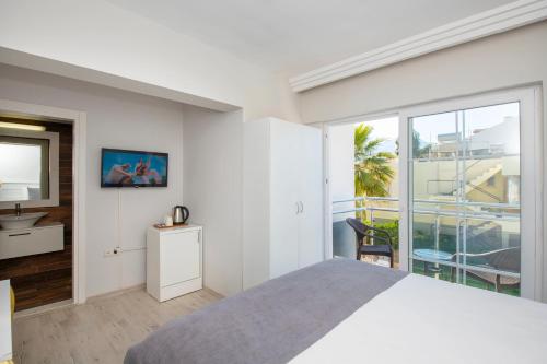 Postel nebo postele na pokoji v ubytování Mia Casa Hotel