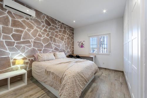 Un pat sau paturi într-o cameră la Finca Pequeñas Estrellas