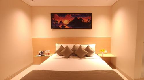 Morvee Hotels Durgapurにあるベッド