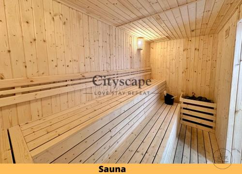 a wooden sauna with a bench in a room at Alinea Suites Shah Alam Seksyen 14 by Cityscape in Shah Alam