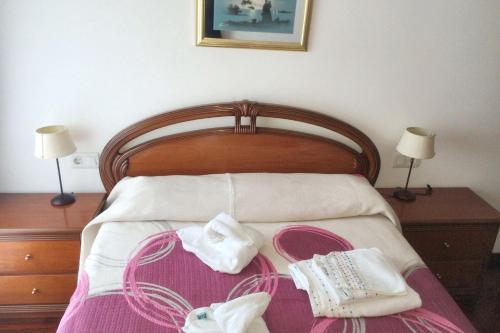 Postel nebo postele na pokoji v ubytování Charming Apartment in El Grove, Sea View