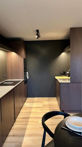 Una cocina o cocineta en Cosy appartement