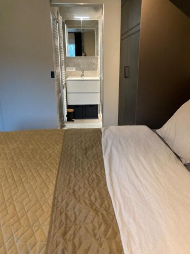 Una cama o camas en una habitación de Cosy appartement