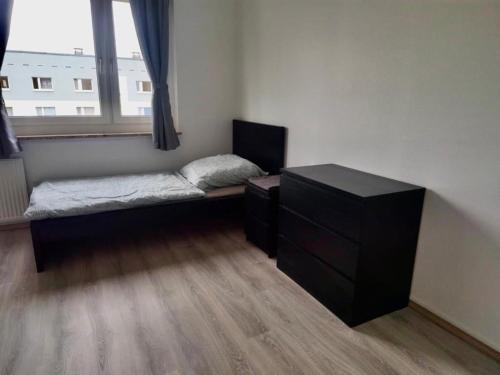 Ένα ή περισσότερα κρεβάτια σε δωμάτιο στο 5 Betten Monteurwohnung in Zeithain