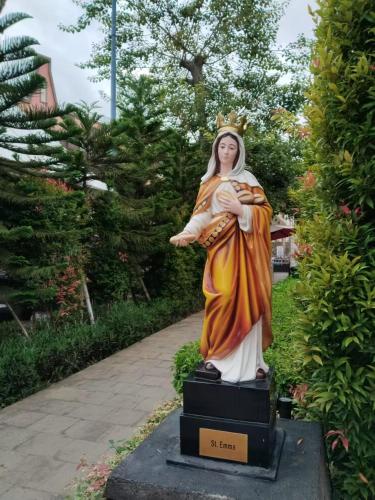 a statue of a goddess in a garden at PIK 2 Tokyo Riverside 2 BEDROOM in Gedong