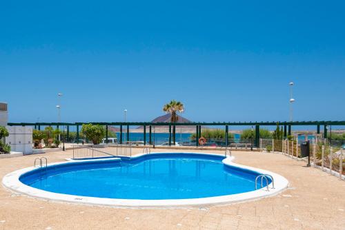 Bazén v ubytování MEDANO4YOU The Harbour Holiday Home nebo v jeho okolí