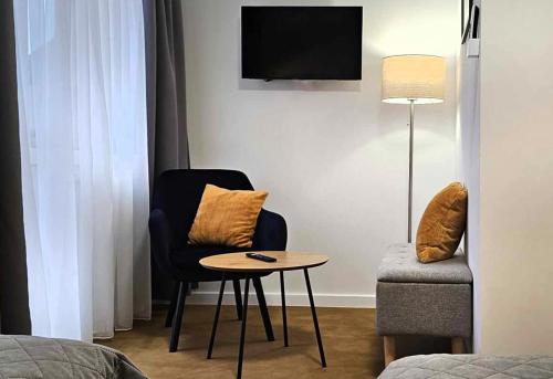 TV a/nebo společenská místnost v ubytování Hotel Ognisty Ptak