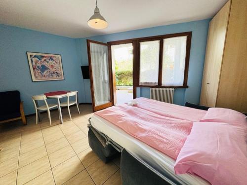 A bed or beds in a room at Apartment Alberto