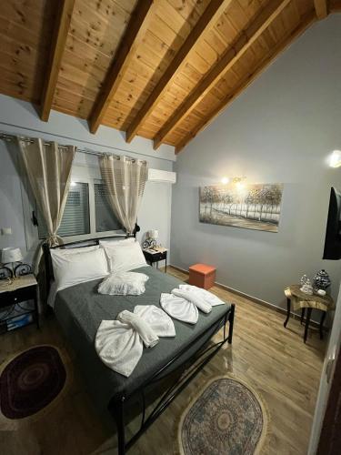 Кровать или кровати в номере Blue waves house 1