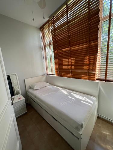Ένα ή περισσότερα κρεβάτια σε δωμάτιο στο Stavento Apartments