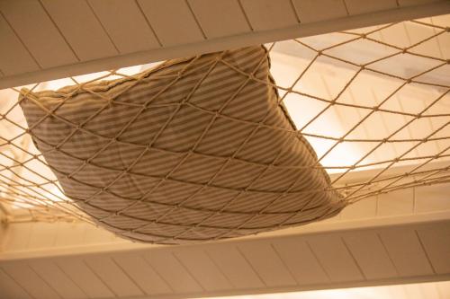 a large net hanging from the ceiling of a building at Spa Villa Skaloma in Nafpaktos