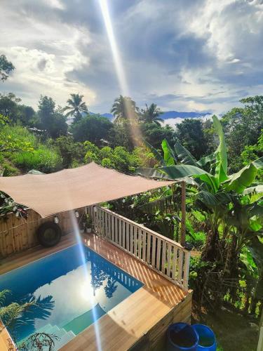 a view of a swimming pool from a house at Tanay Private Staycation house in Tanay