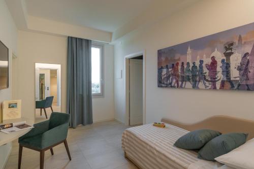 Ένα ή περισσότερα κρεβάτια σε δωμάτιο στο AGRITURISMO TERRA VOLONTERI