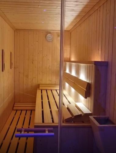 a inside of a sauna with a bench in it at Nordseehotel Kröger in Langeoog
