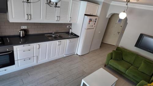 Η κουζίνα ή μικρή κουζίνα στο SUNSET BEACH CLUB LEBRENTALS