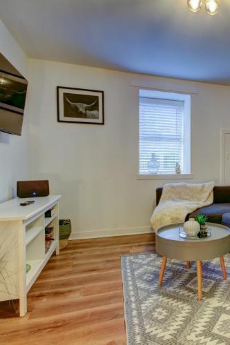 a living room with a couch and a table at The Bailey - Troon - Coorie Doon Stays in Troon