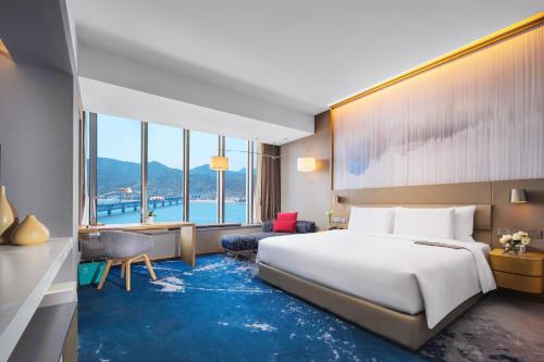 Postel nebo postele na pokoji v ubytování Le Meridien Hangzhou, Binjiang