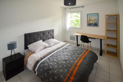 Postel nebo postele na pokoji v ubytování Le Préville avec terrasse et parking gratuit