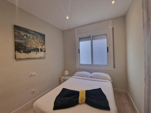Posteľ alebo postele v izbe v ubytovaní BARCELONA DUPLEX DE 3 HABITACIONES