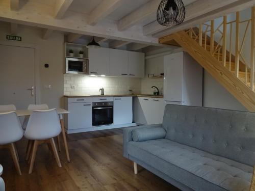 Kuchyň nebo kuchyňský kout v ubytování Apartamentos rurales la tienda de Villanueva Mar y montaña