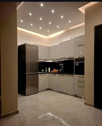 Η κουζίνα ή μικρή κουζίνα στο Stay in Athens - muses