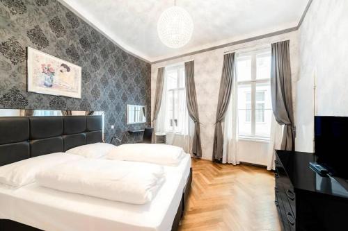 Una cama o camas en una habitación de Carlton Suites