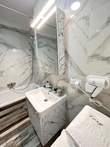 Koupelna v ubytování Coresi Mall Exclusive #Collection Apartments & Studios Brasov