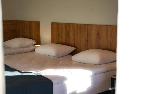 Ein Bett oder Betten in einem Zimmer der Unterkunft Peak Hotel Kazbegi