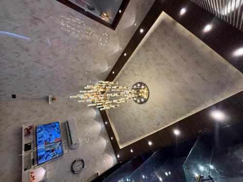 an overhead view of a chandelier in a building at Hotel Ramay Palace in Ayodhya