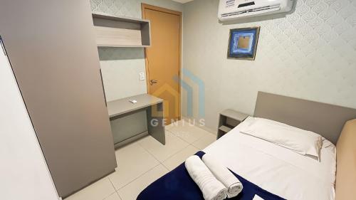 a hospital room with a bed and a desk at Eco Summer Tambaú WB Genius Flats in João Pessoa
