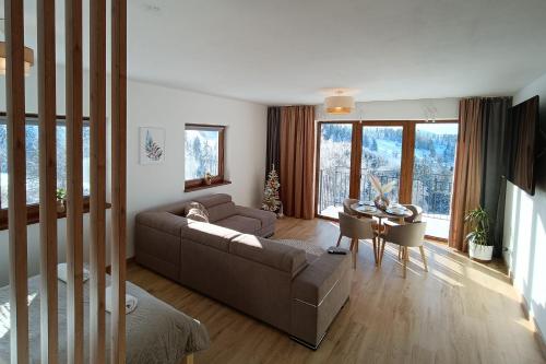 Χώρος καθιστικού στο Apartament Dwa Słońca