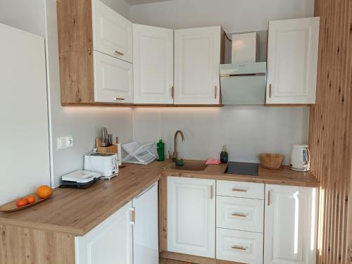 Η κουζίνα ή μικρή κουζίνα στο Apartament Dwa Słońca