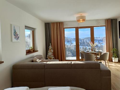 Χώρος καθιστικού στο Apartament Dwa Słońca