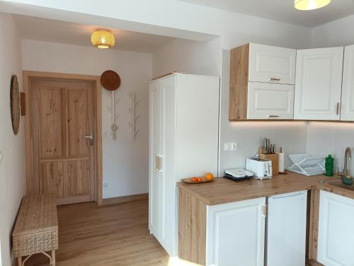 Η κουζίνα ή μικρή κουζίνα στο Apartament Dwa Słońca