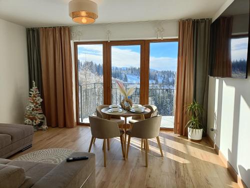Χώρος καθιστικού στο Apartament Dwa Słońca