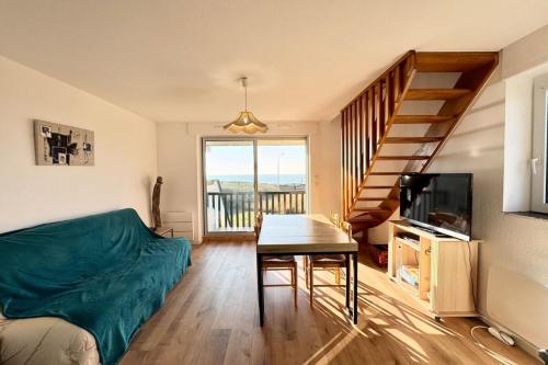Μια τηλεόραση ή/και κέντρο ψυχαγωγίας στο Duplex - Balcon - Vue océan 180