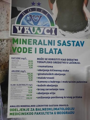 a sign with a cake on top of it at Apartmani Kovačević MKM Banja Vrujci in Gunjica